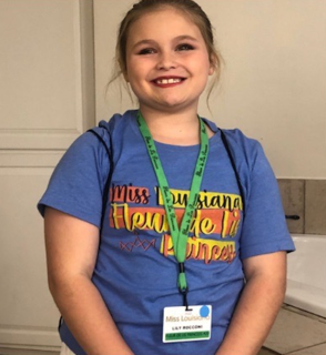 Photo of a smiling girl before participating in the Eat to Lose program